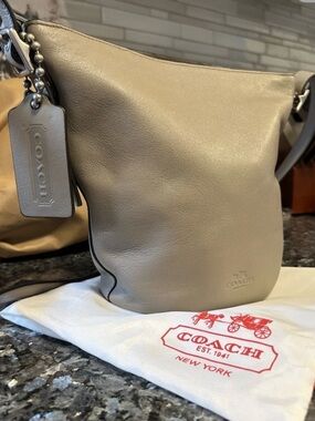 PRISTINE NEW Coach Legacy
Bleecker Mini Duffle Taupe Leather
32281 + Dust Bag